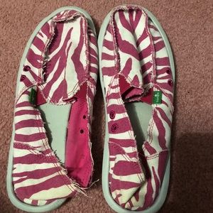 Pink and white zebra striped Sanuks